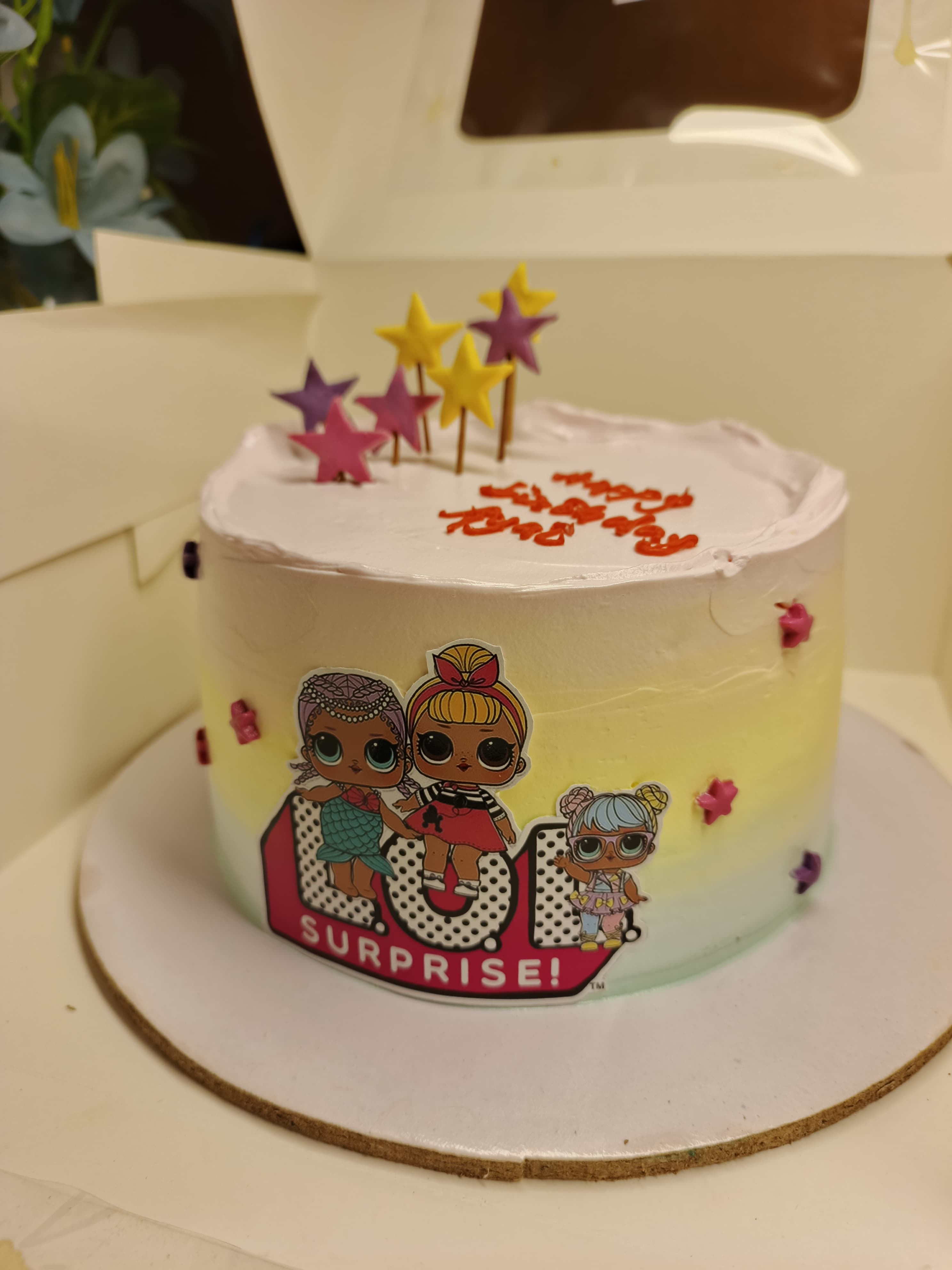 Colourful doll theme birthday cake