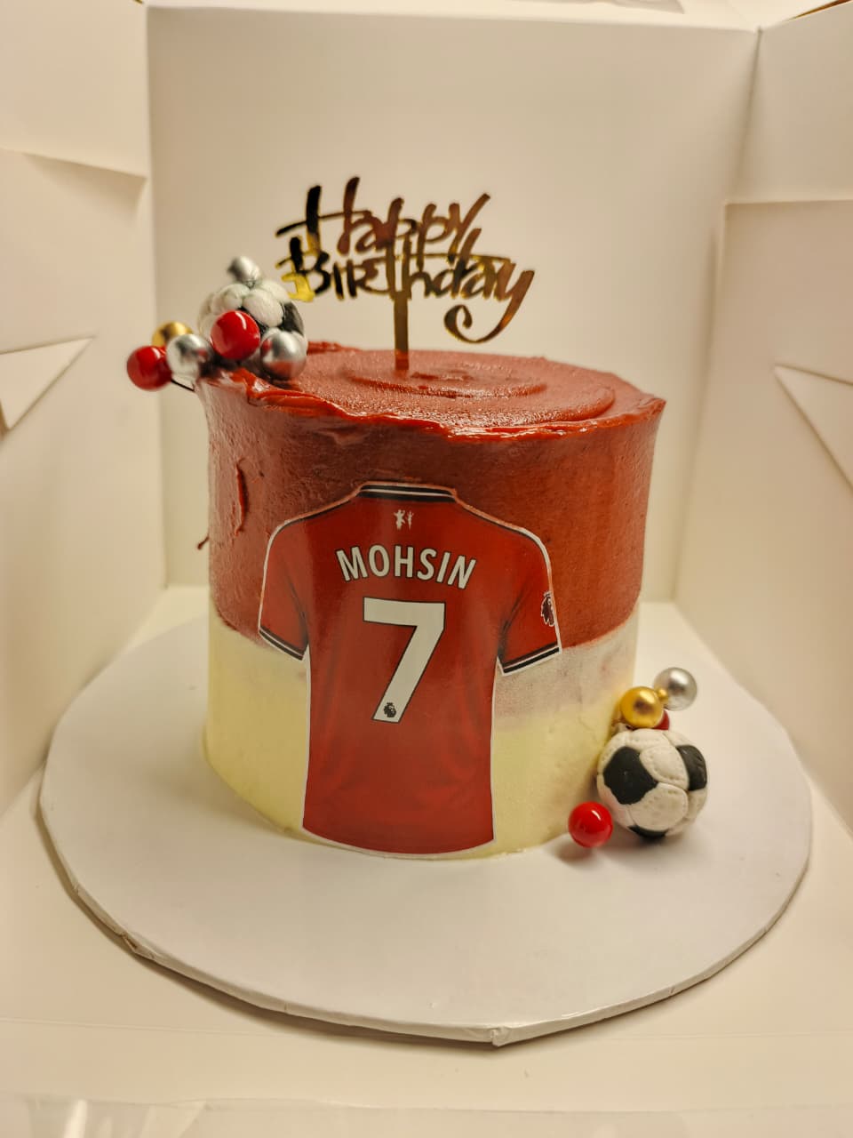 Football theme cake with jersey topper