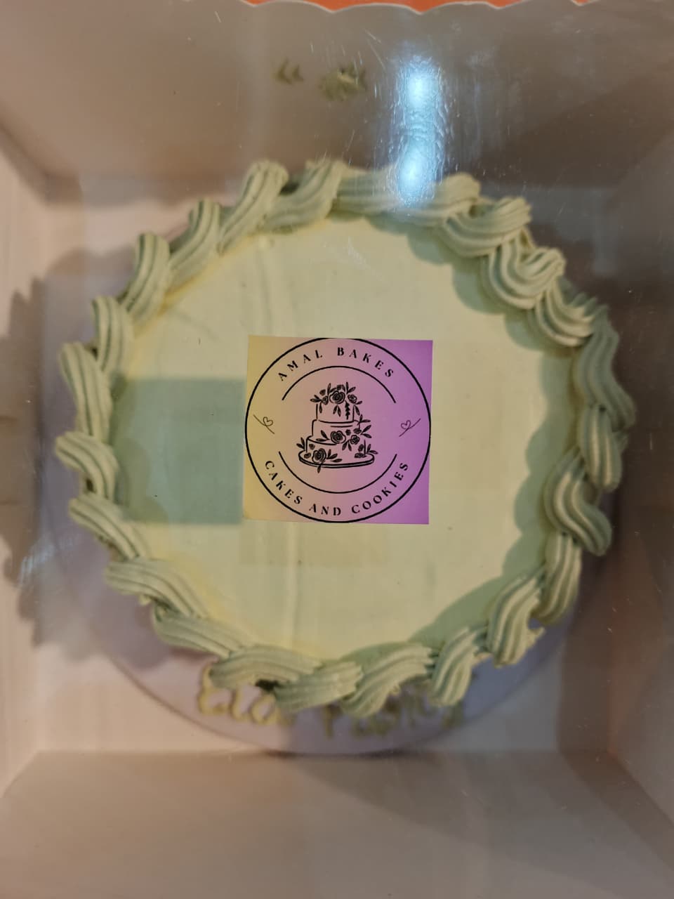 Branded round celebration cake